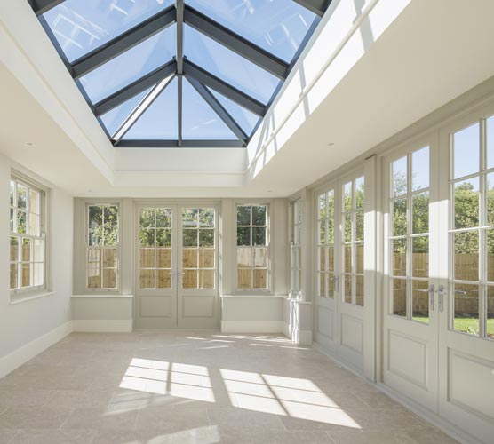 A K Construction | Lake Toxaway, NC | custom sunroom with glass roof and french doors